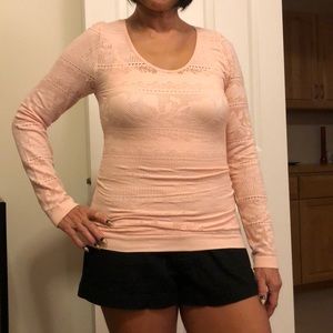 Pink laser cut long sleeve top